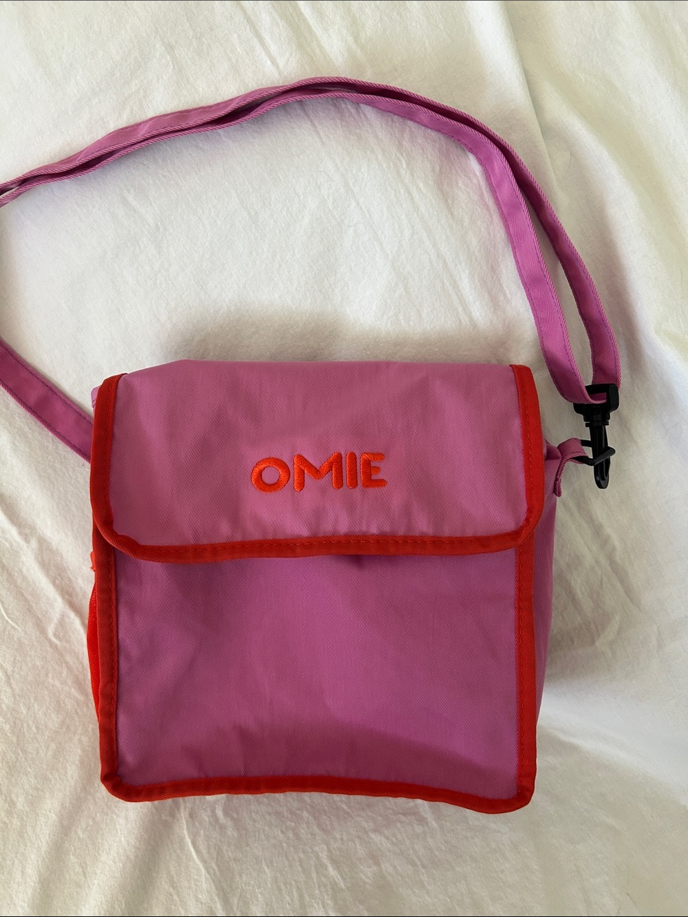 OMIE Pink Crossbody Bag with Red Trim